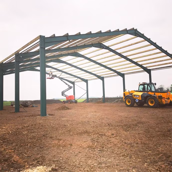 Steel-framed barn under construction in Warwickshire