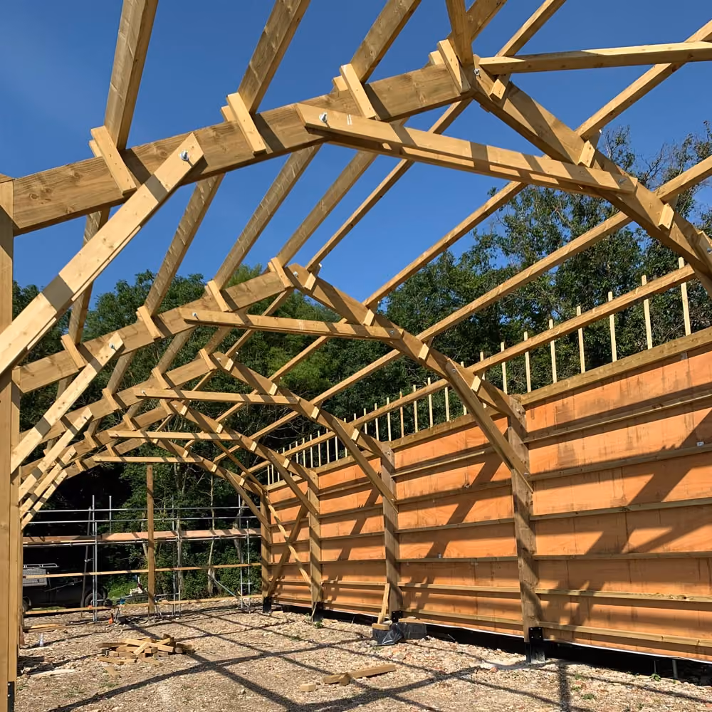 Timber barn construction in progress, stage 1