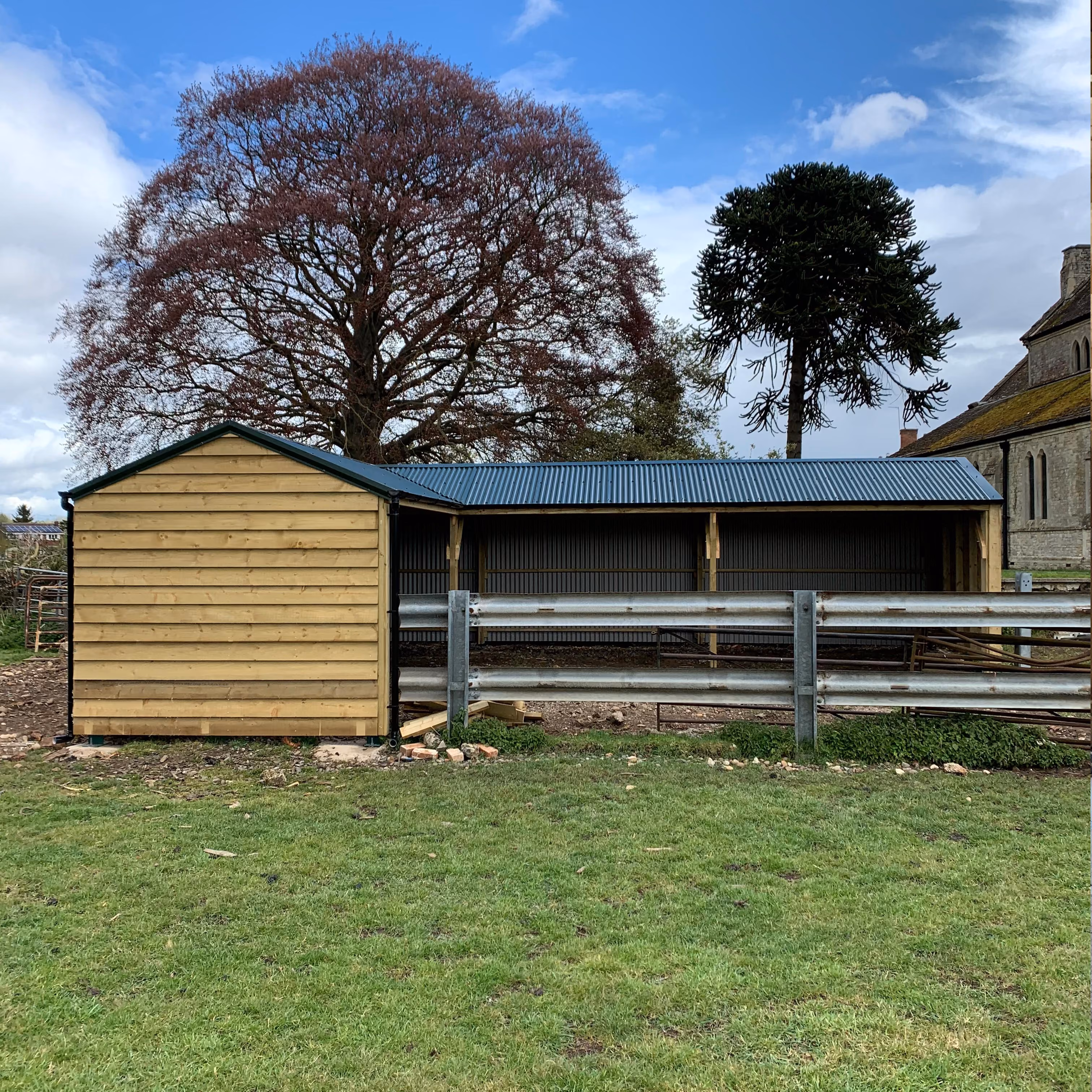 Timber barn construction in progress, stage 3