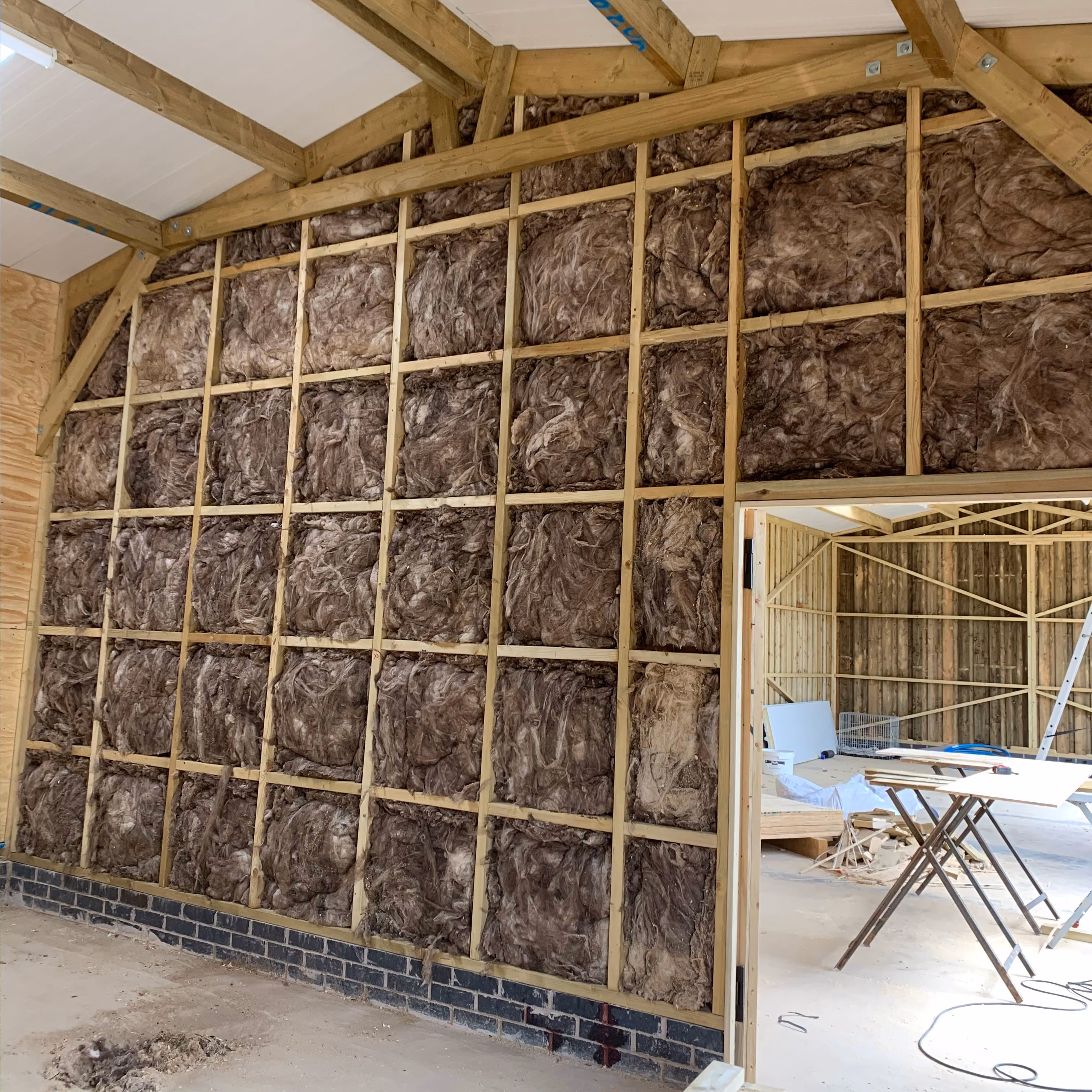 Timber barn construction in progress, stage 4